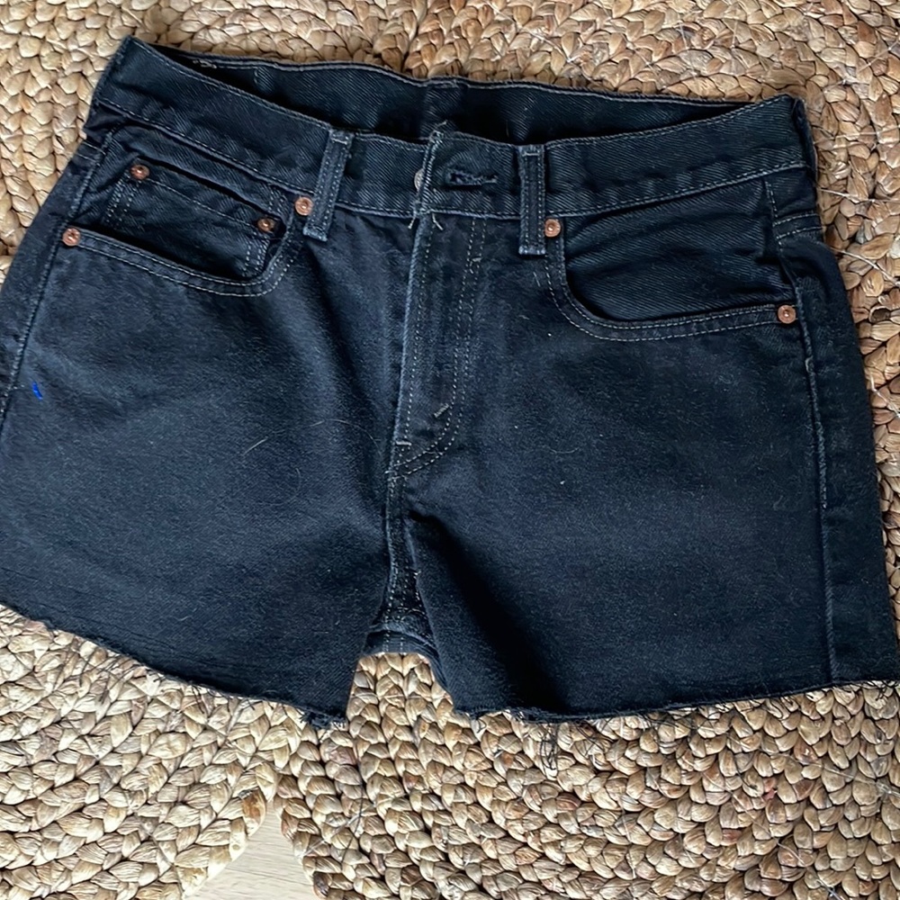 Levi’s black cutoff Jean shorts.